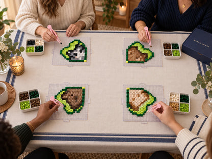 Four friends making a four-leaf fuse bead artwork together